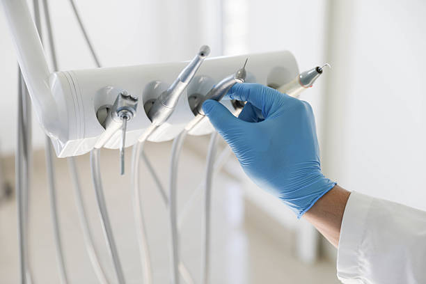 Professional Tooth Extraction technician working in Piedmont, OK